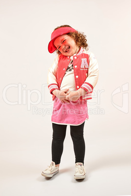 Little Girl Fashion Model With Red Cap