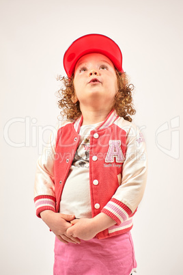 Little Girl Fashion Model With Red Cap