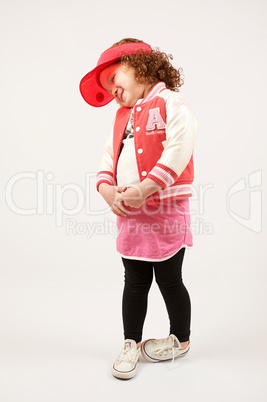 Little Girl Fashion Model With Red Cap