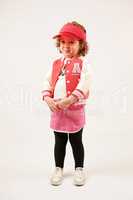 Little Girl Fashion Model With Red Cap