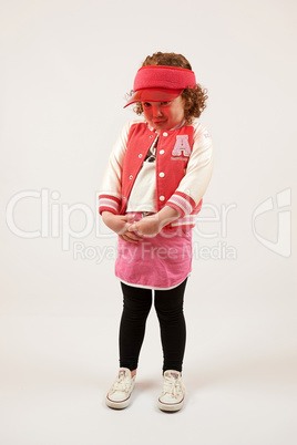 Little Girl Fashion Model With Red Cap