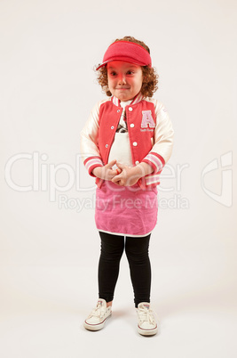 Little Girl Fashion Model With Red Cap