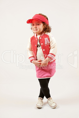 Little Girl Fashion Model With Red Cap