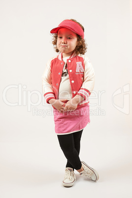 Little Girl Fashion Model With Red Cap