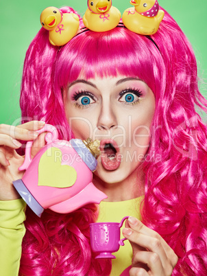 Girl doll with pink hair
