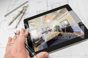 Hand of Architect on Computer Tablet Showing Bedroom Over House