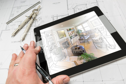 Hand of Architect on Computer Tablet Showing Living Room Over Ho