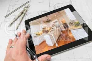 Hand of Architect on Computer Tablet Showing Kitchen Photo Over