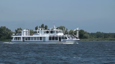 Pleasure cruise boat traveling the river