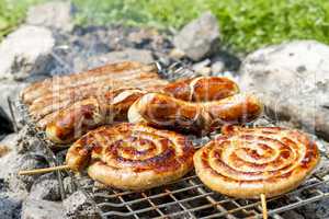 Sausages on grill outdoor