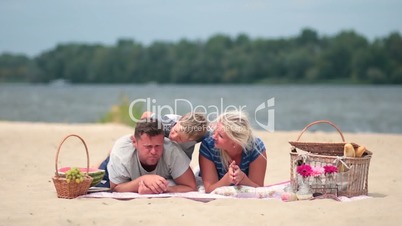 Happy family on vacation realaxing on the beach