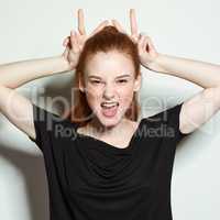 Emotional beauty portraits red-haired girl.