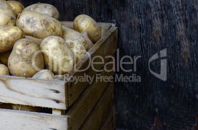 potatoes in a wooden box