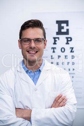 Optometrist smiling in ophthalmology clinic