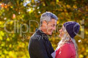 Side view of happy couple at park