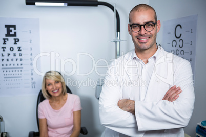 Optometrist and female patient in ophthalmology clinic