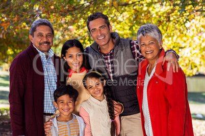 Portrait of smiling multi-generation family at park