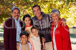 Portrait of smiling multi-generation family at park