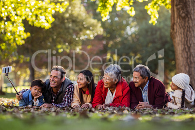 Man with happy family taking selfie