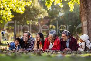 Man with happy family taking selfie