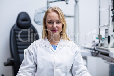 Portrait of smiling female optometrist