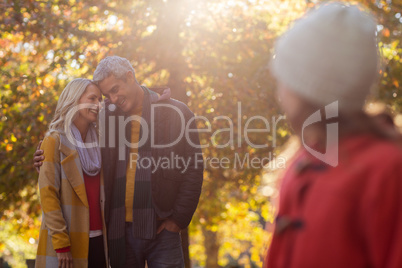 Girl looking towards romantic couple