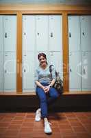 Mature student sitting in the locker room