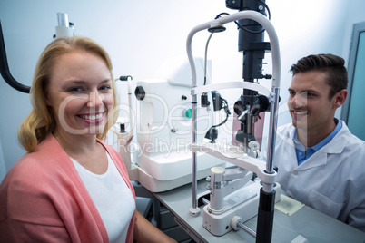 Portrait of female patient smiling in ophthalmology clinic