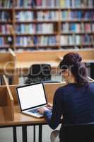 Mature student using laptop to help with studying