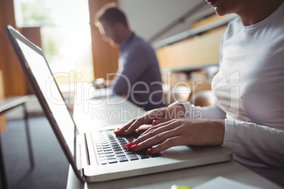 Mature student using laptop