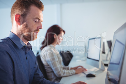 Mature student using computer