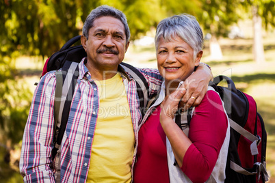 Portrait of hiker couple embracing