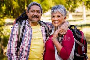 Portrait of hiker couple embracing