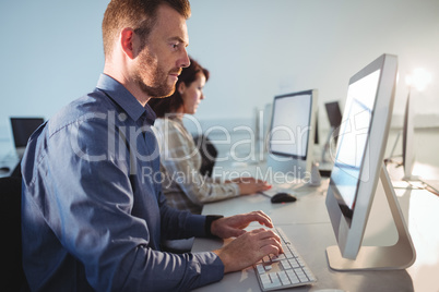 Mature student using computer