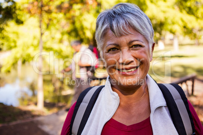 Portrait of woman holding a backpack Portrait of woman holding a backpack