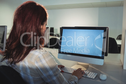 Mature student using computer