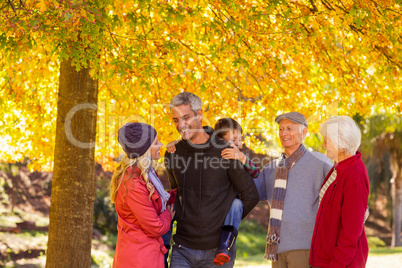 Multi-generation family enjoying at park