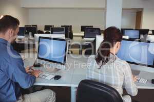 Mature students using computer
