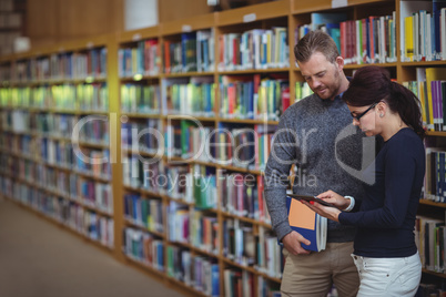 Mature students using digital tablet