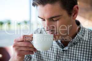 Man having coffee in coffee shop