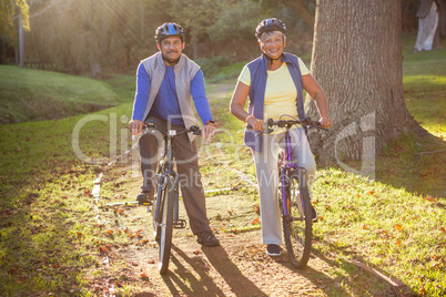 Mature couple doing a bike ride