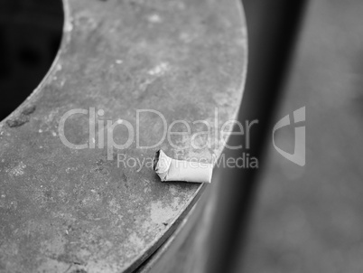 Cigarette butt waste in black and white