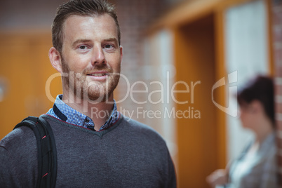 Mature student standing in the corridor