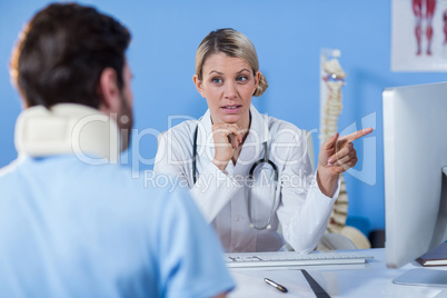 Physiotherapist interacting with patient