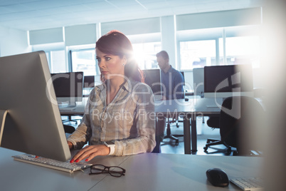 Mature student using computer