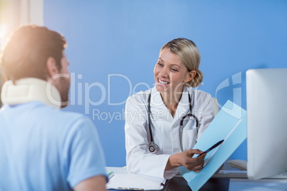 Physiotherapist interacting with patient