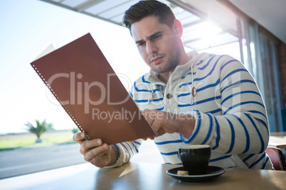 Man checking out the menu