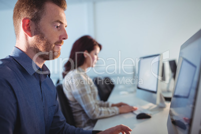 Mature student using computer