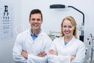 Optometrists standing in ophthalmology clinic