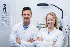 Optometrists standing in ophthalmology clinic
